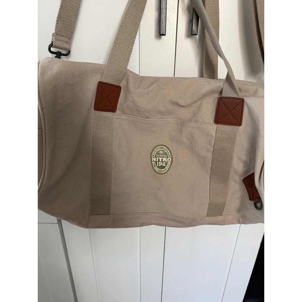 Guinness Nitro IPA Tan Canvas Duffle‎ Bag Strap Handles Alternative Travel